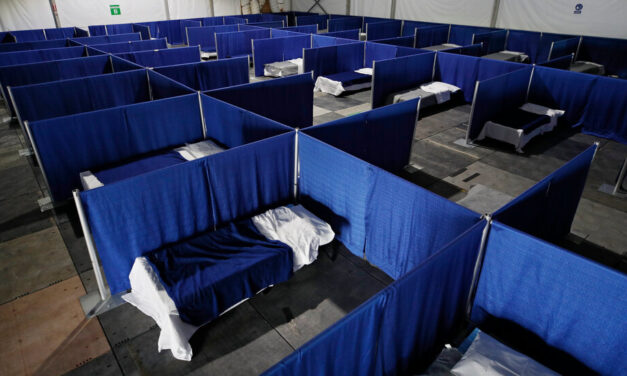 C.D.C. Shortens Isolation Period for People With Covid